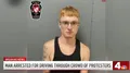 After being arrested for running over a crowd of protesters in Culpeper, Virginia.