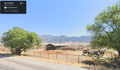 The exact same ranch in the video with mountains in the background. She definitively is from Brigham City Utah. It's called "The Davis Ranch"