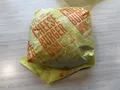 A burger wrapper from McDonalds, also made from paper.