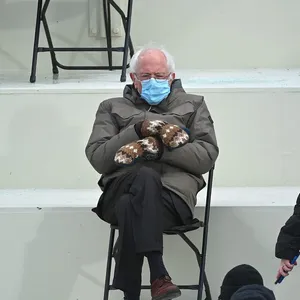 Bernie Sanders sitting.jpg