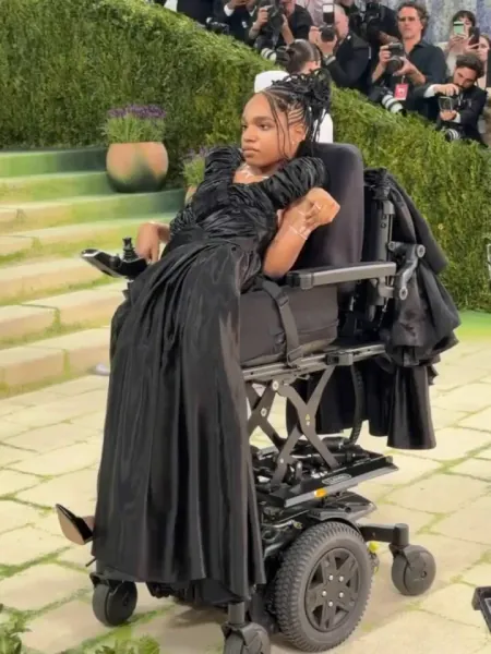 File:PlusSizedDisabledTransBlackWoman.webp